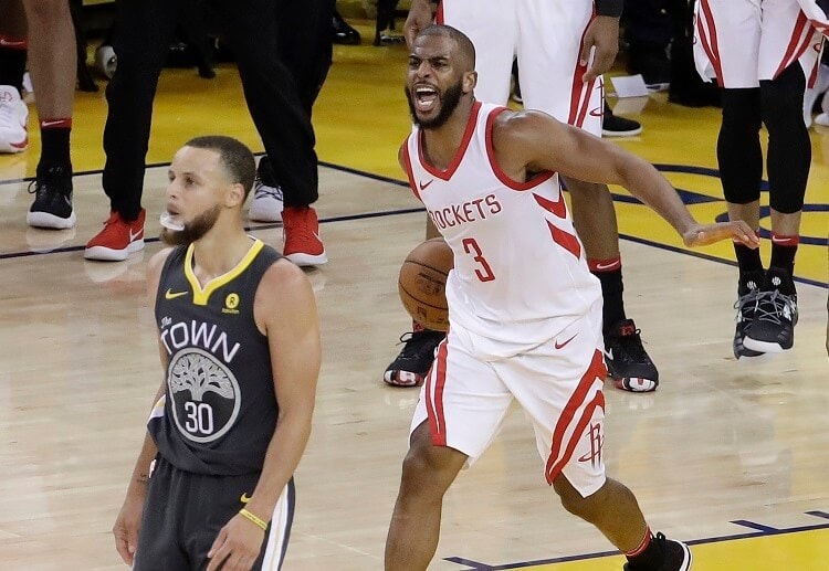 Chris Paul celebrates after the Rockets successfully trailed basketball betting favourites the Warriors to a 2-2 series