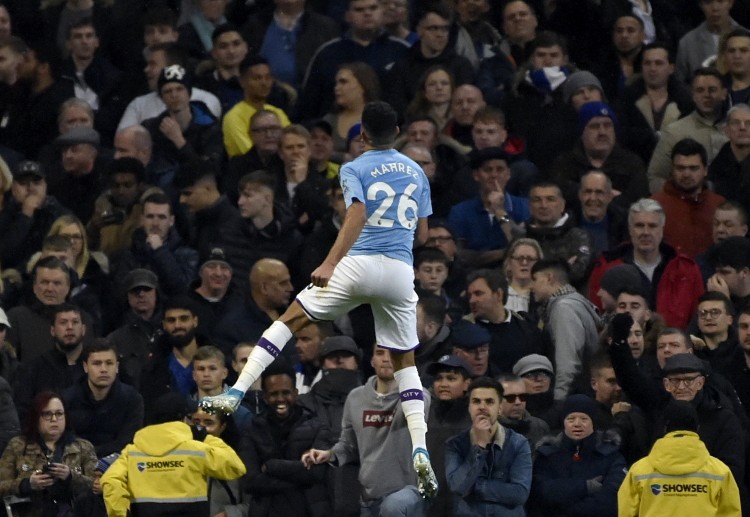 Riyad Mahrez scores Man City's goal that led to their 2-1 Premier League win against Chelsea