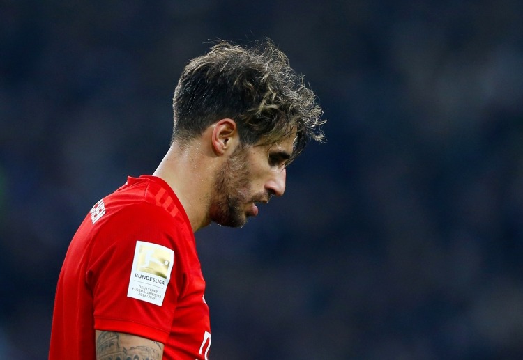 Javi Martinez walks off the pitch after being booked twice in Bayern Munich's Bundesliga clash with Gladbach