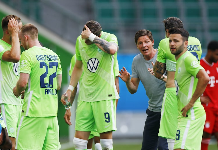 Wolfsburg players look frustrated during their recent Bundesliga clash against Bayern Munich
