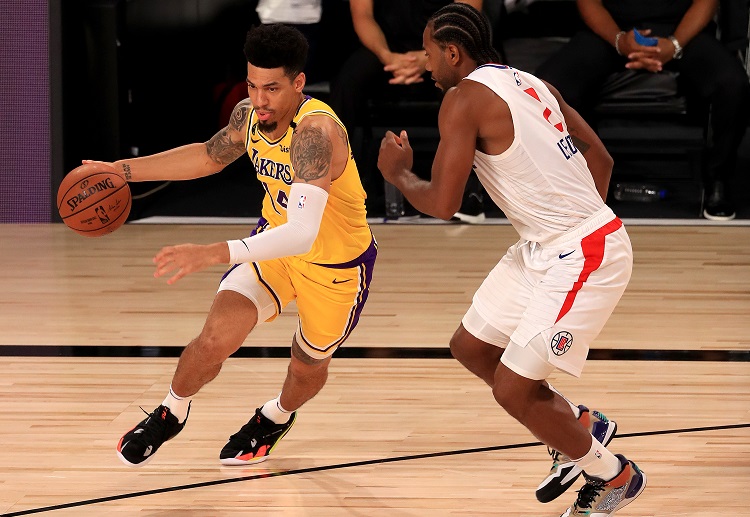 LA Clippers shooting guard Kawhi Leonard against a Los Angeles Lakers player during an NBA match