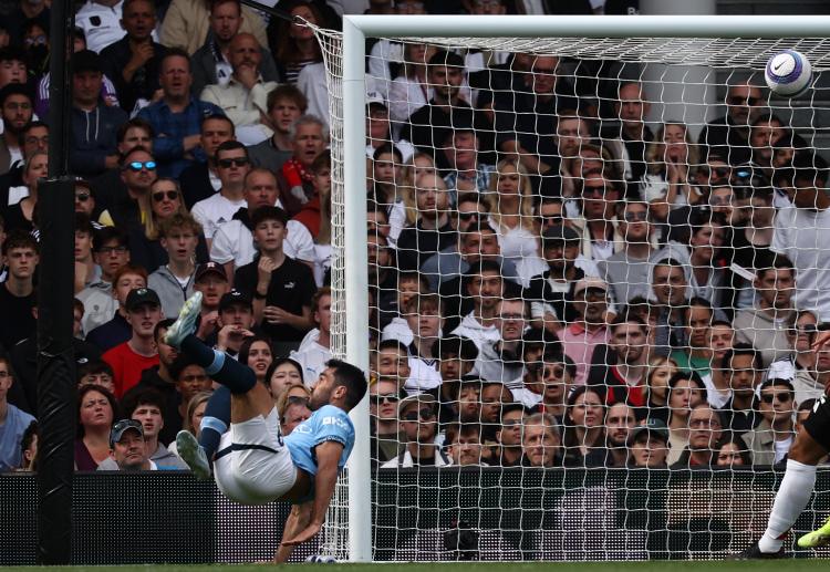 Ilkay Gundogan's acrobatic finish gives Man City the lead over Fulham in their Premier League clash